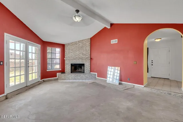 an empty room with windows