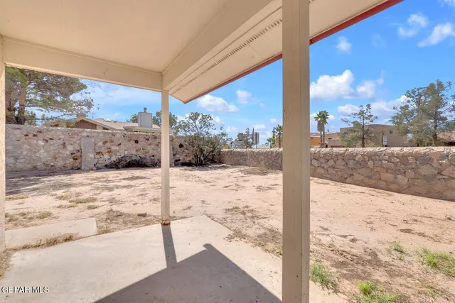 a view of a backyard of a house