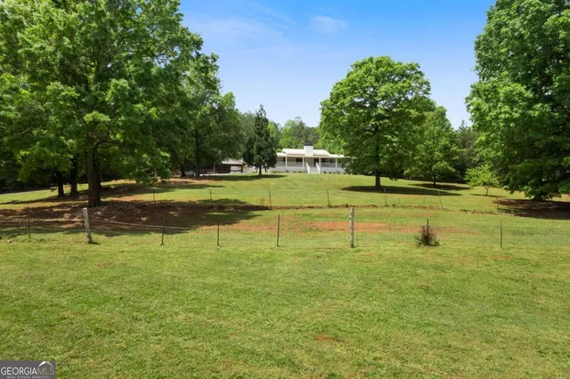 a view of a park with swings