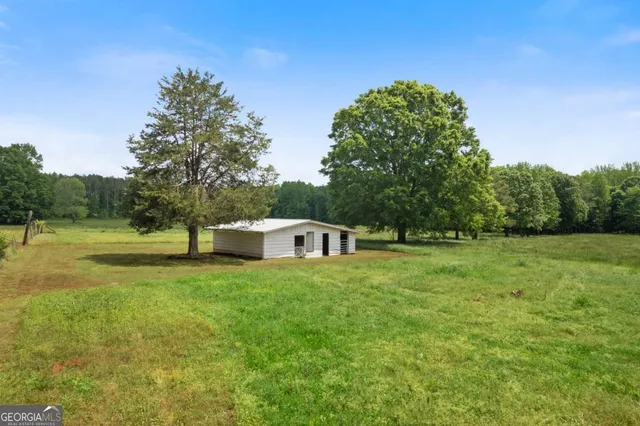 a house view with a garden space