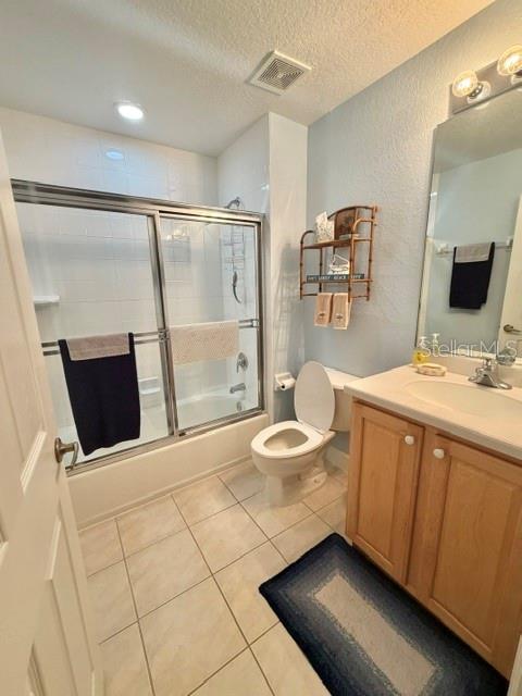 13413 Gasparilla Road, Unit 304 Placida, FL 33946 - Photo 23 of 28 a bathroom with a sink a toilet and mirror