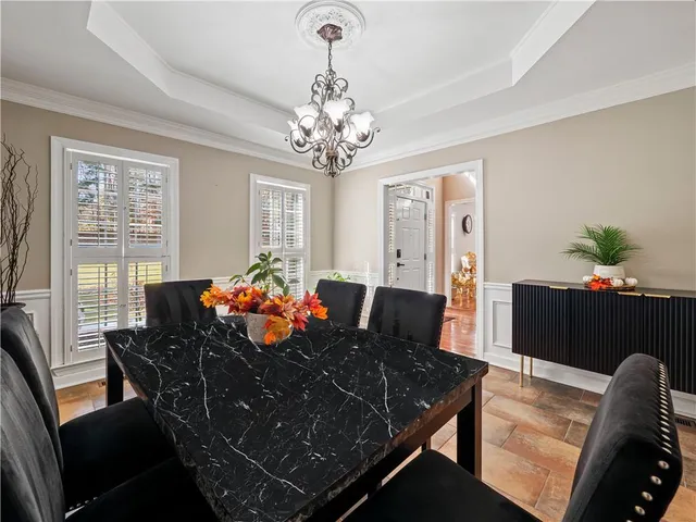a bathroom with a sink toilet and mirror