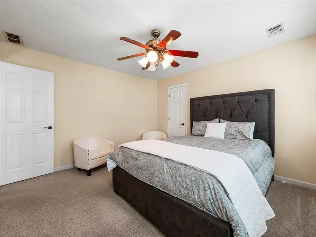 a hallway with a wooden door
