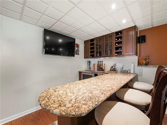 a room with lots of table and chairs