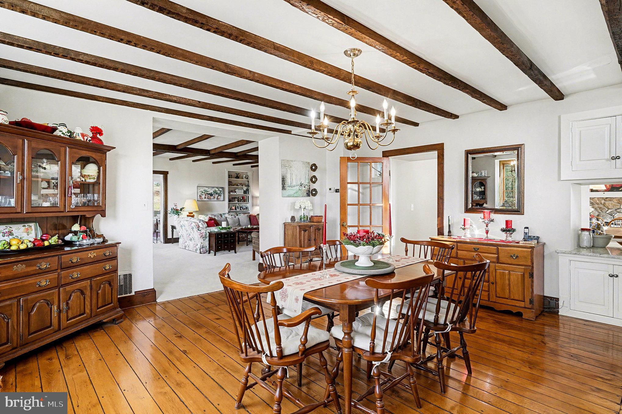 284 Stony Run Road Spring City, PA 19475 - Photo 23 of 70 a view of a dining room with furniture and wooden floor