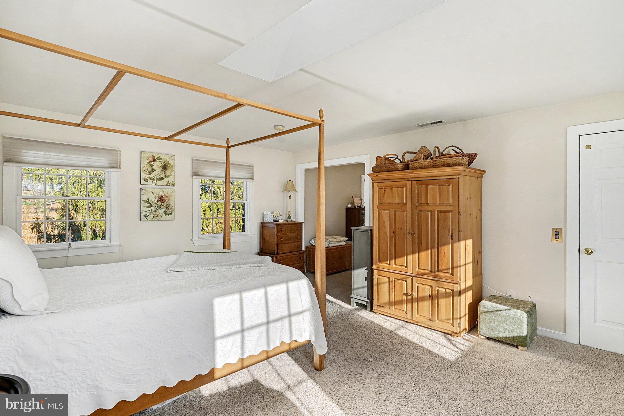 284 Stony Run Road Spring City, PA 19475 - Photo 29 of 70 a spacious bedroom with a bed and a window