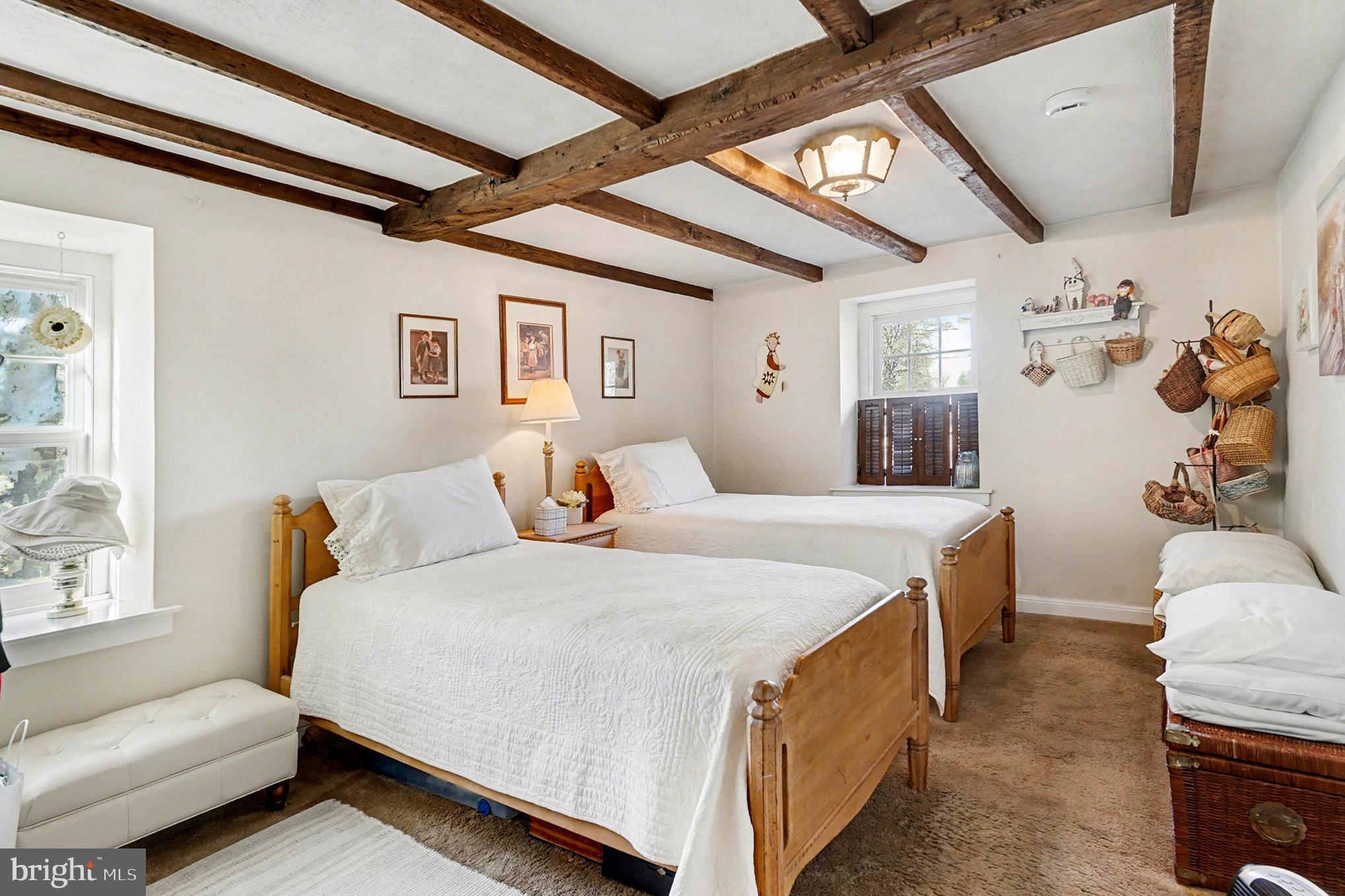 284 Stony Run Road Spring City, PA 19475 - Photo 37 of 70 a bedroom with a bed and a couch