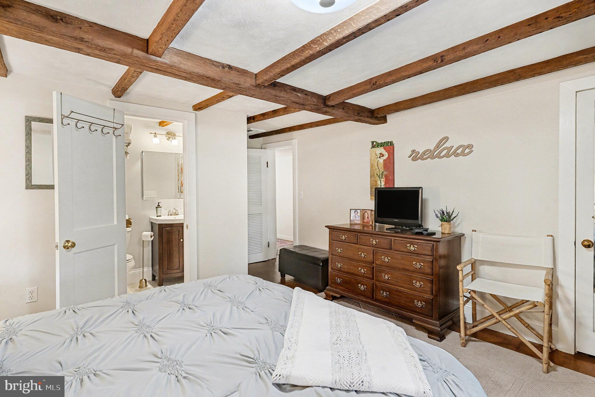 284 Stony Run Road Spring City, PA 19475 - Photo 39 of 70 a bedroom with a bed and a flat screen tv