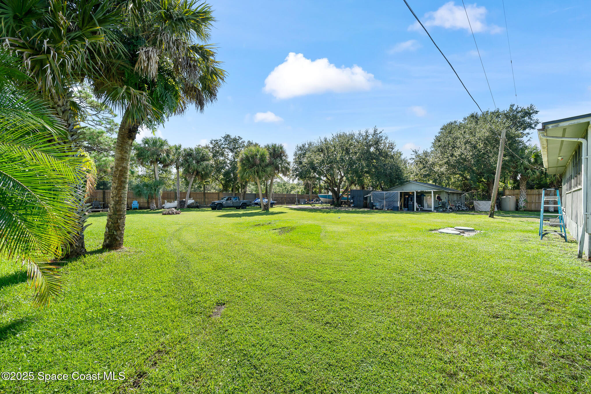 9633 Honeysuckle Drive Sebastian, FL 32976 - Photo 25 of 40 a view of a volley ball court