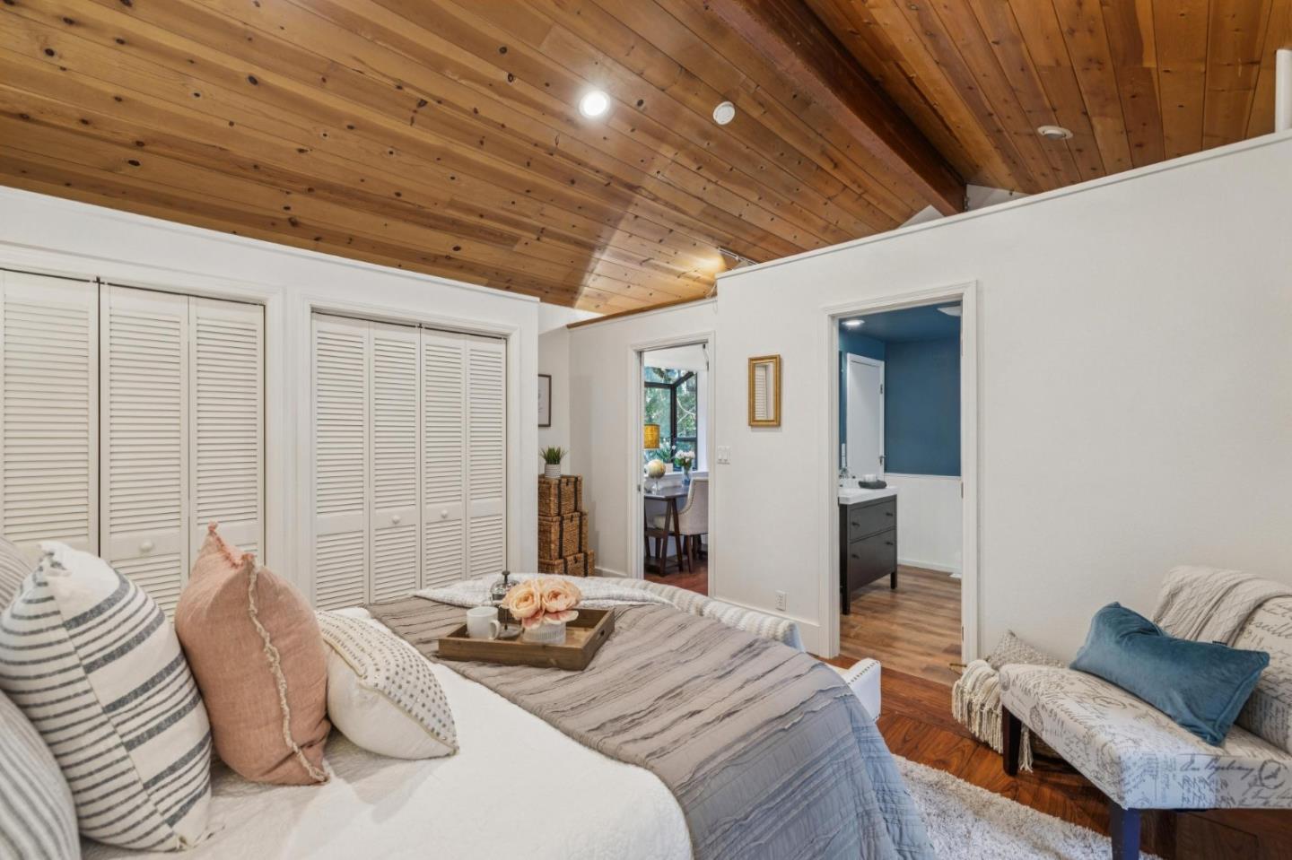 20080 Gist Road Los Gatos, CA 95033 - Photo 14 of 35 a bedroom with furniture and a bed