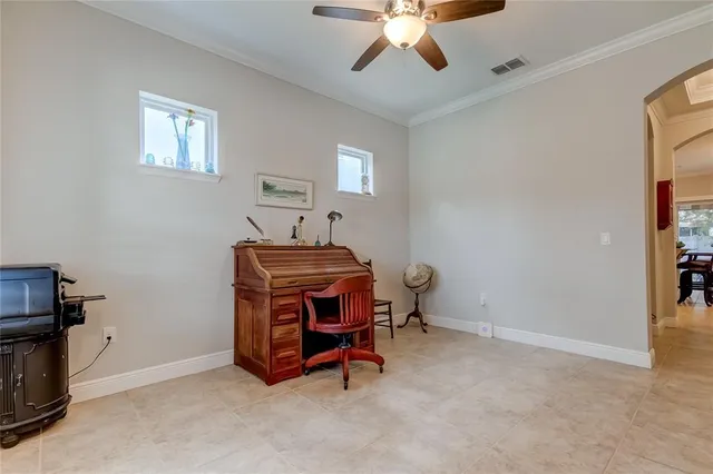 a room with furniture and chandelier