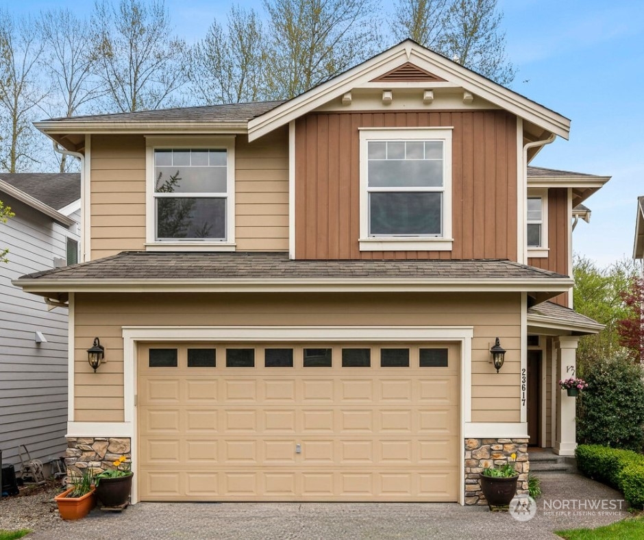 23617 17th Avenue West Bothell, WA 98021 - Photo 1 of 31 a front view of a house with garage