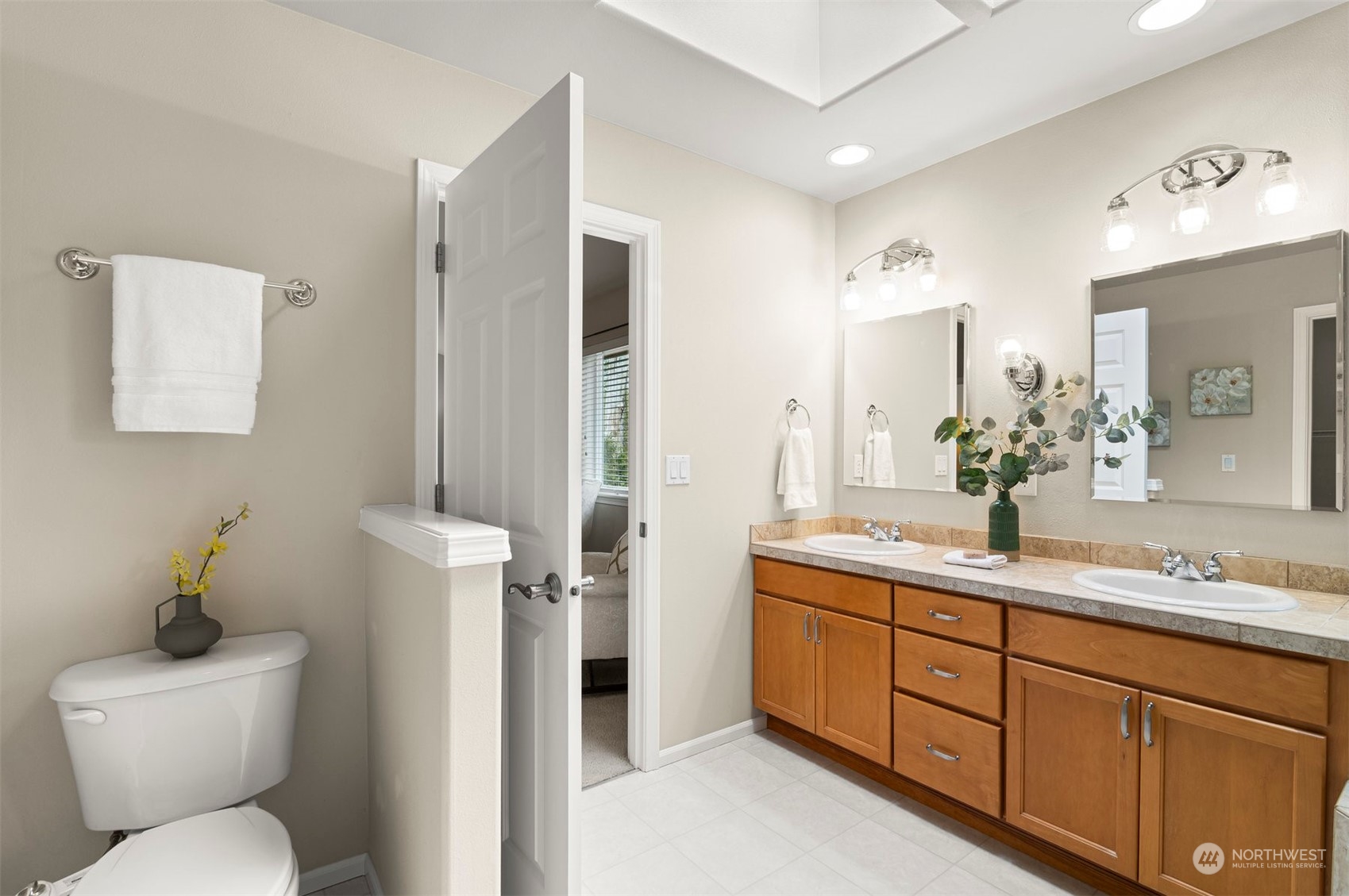 23617 17th Avenue West Bothell, WA 98021 - Photo 19 of 31 a bathroom with a toilet sink and mirror