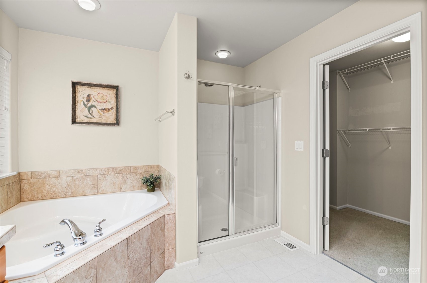 23617 17th Avenue West Bothell, WA 98021 - Photo 20 of 31 a bathroom with a tub a sink and a shower
