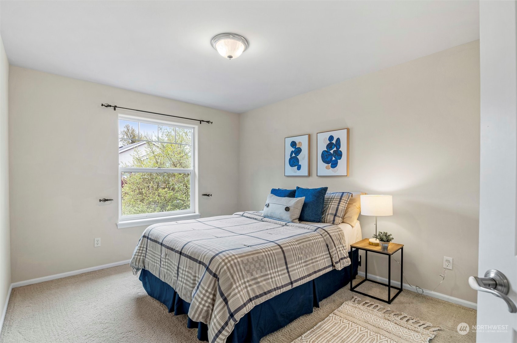 23617 17th Avenue West Bothell, WA 98021 - Photo 23 of 31 a bedroom with a bed and a window