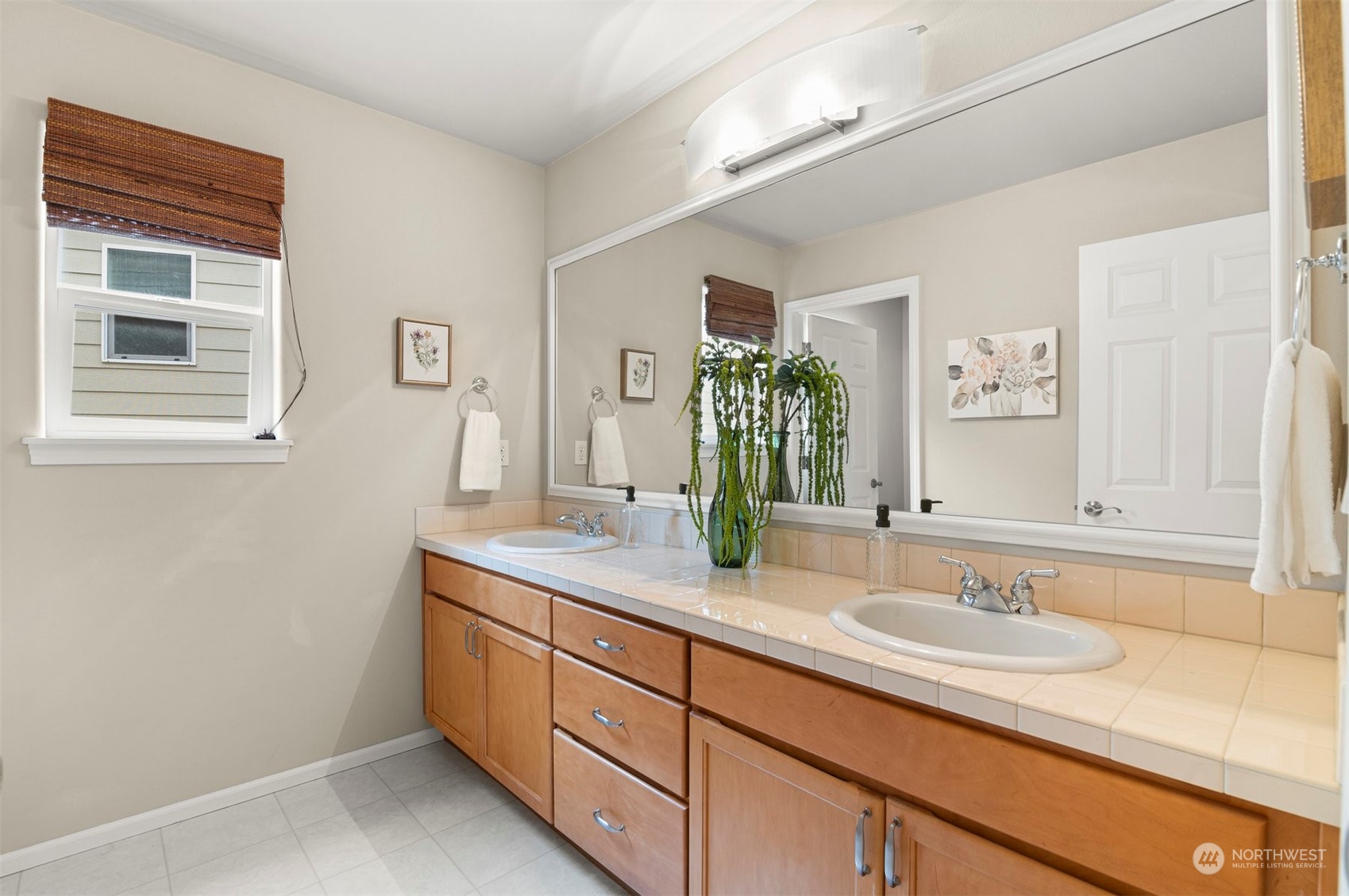 23617 17th Avenue West Bothell, WA 98021 - Photo 25 of 31 a bathroom with a sink and a mirror