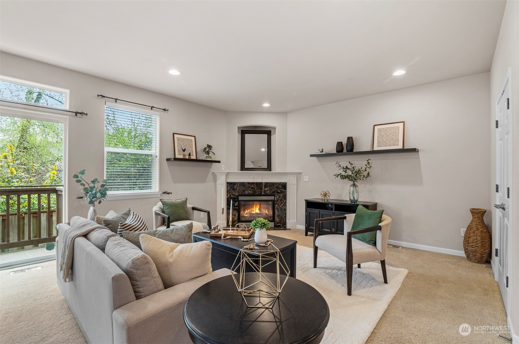 23617 17th Avenue West Bothell, WA 98021 - Photo 4 of 31 a living room with furniture and a fireplace