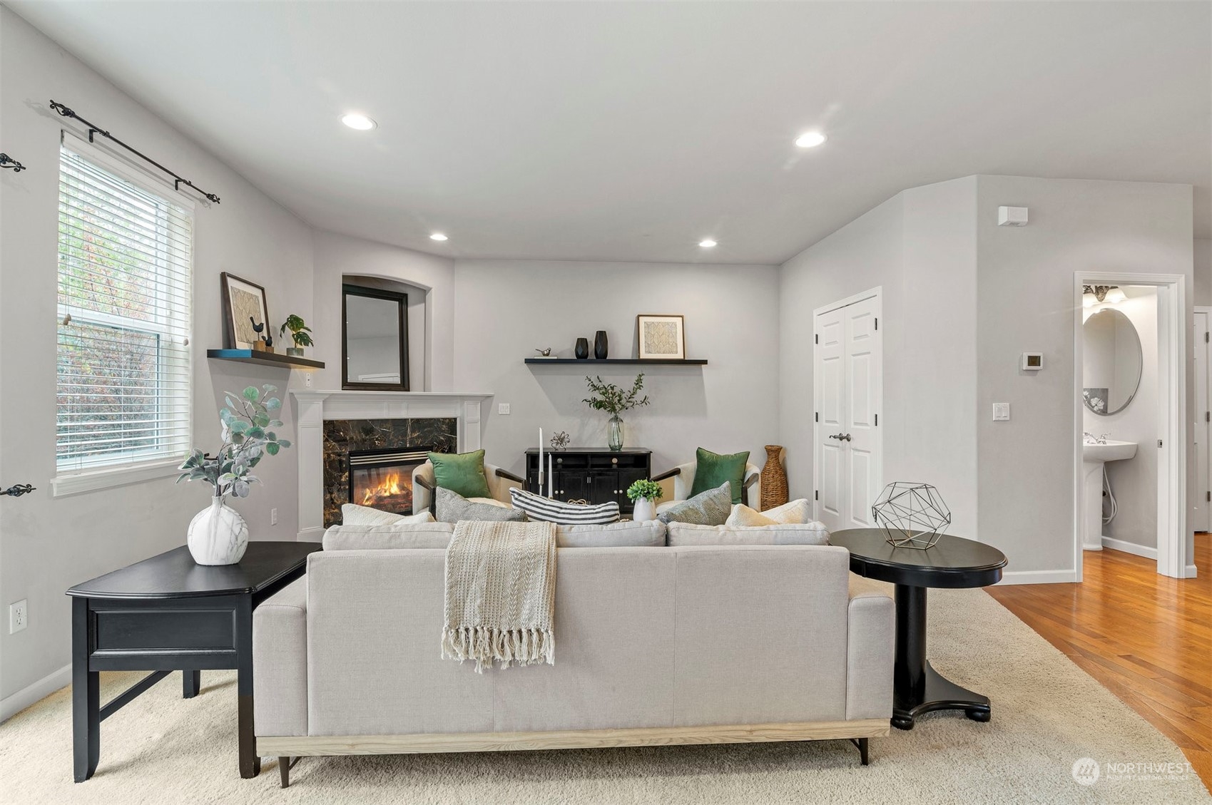 23617 17th Avenue West Bothell, WA 98021 - Photo 6 of 31 a living room with fireplace furniture and a chandelier