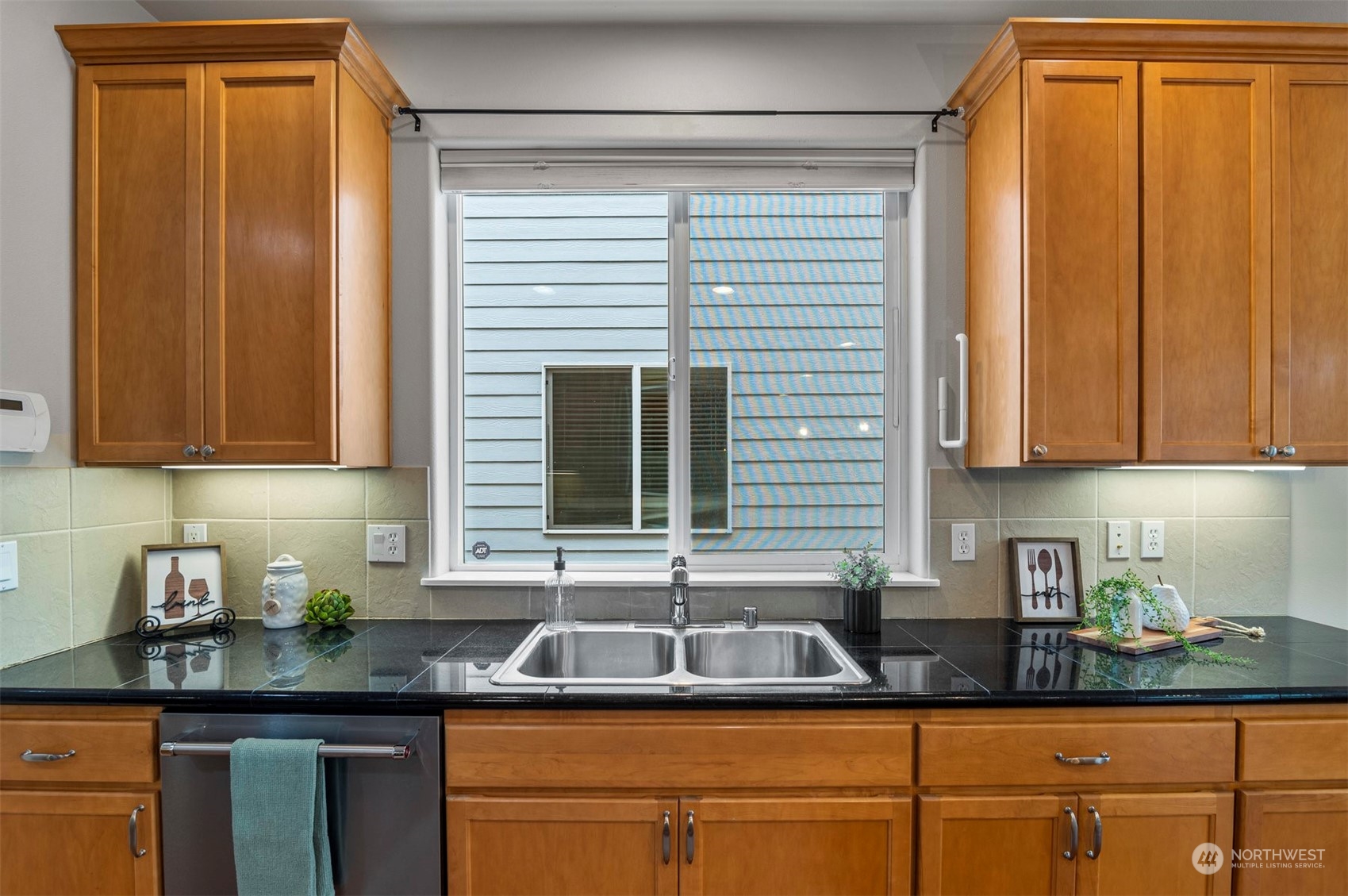 23617 17th Avenue West Bothell, WA 98021 - Photo 10 of 31 a kitchen with granite countertop cabinets sink and window