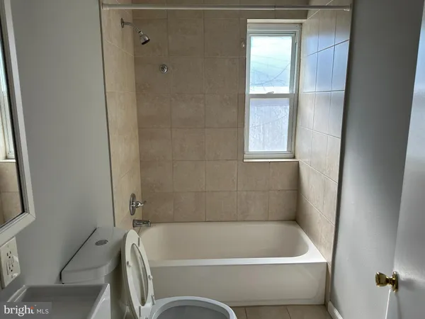 a bathroom with a bathtub