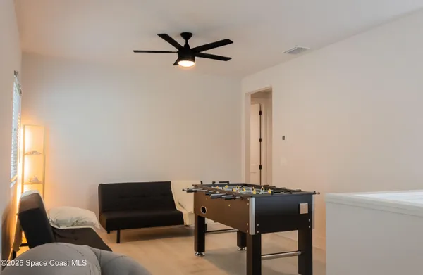 a view of a livingroom with furniture