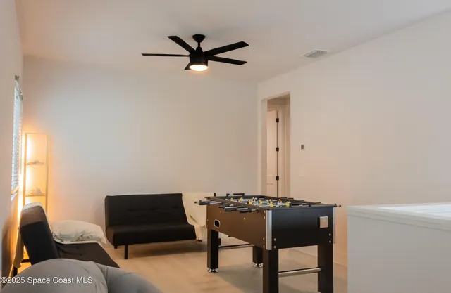 a view of a livingroom with furniture