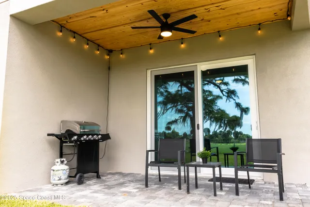a view of a porch with seating space