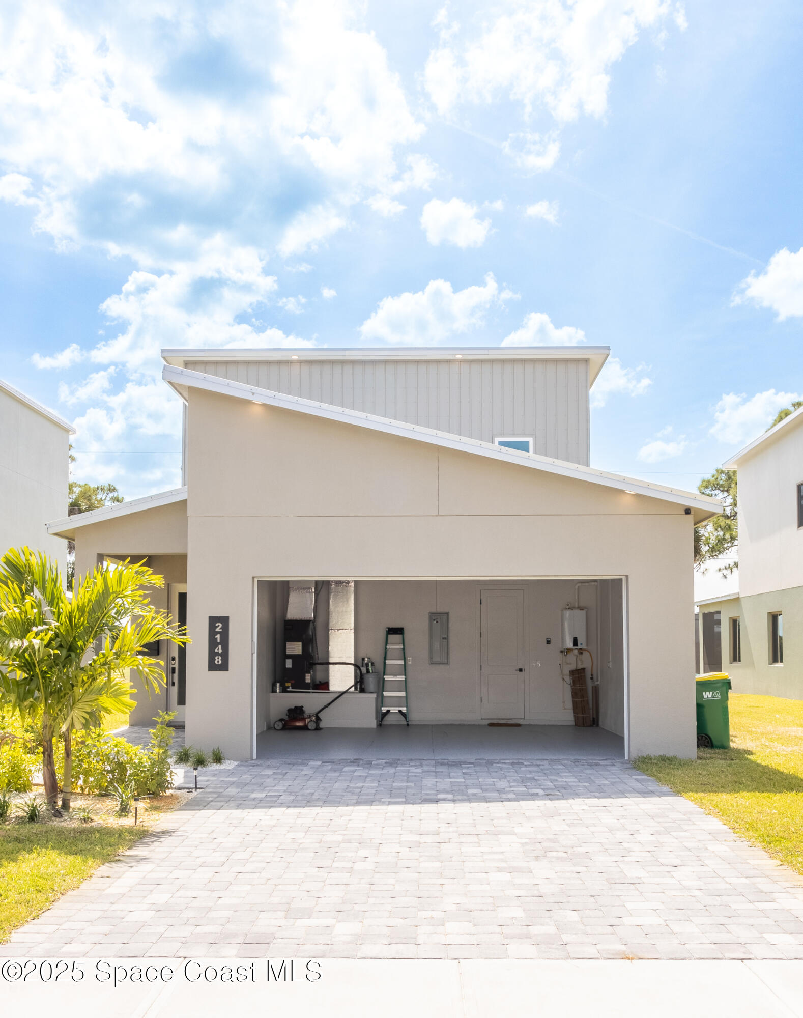 2148 Country Club Road Melbourne, FL 32901 - Photo 5 of 30 a view of a back yard of the building
