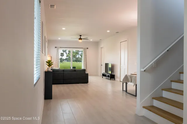 a living room with furniture and a couch