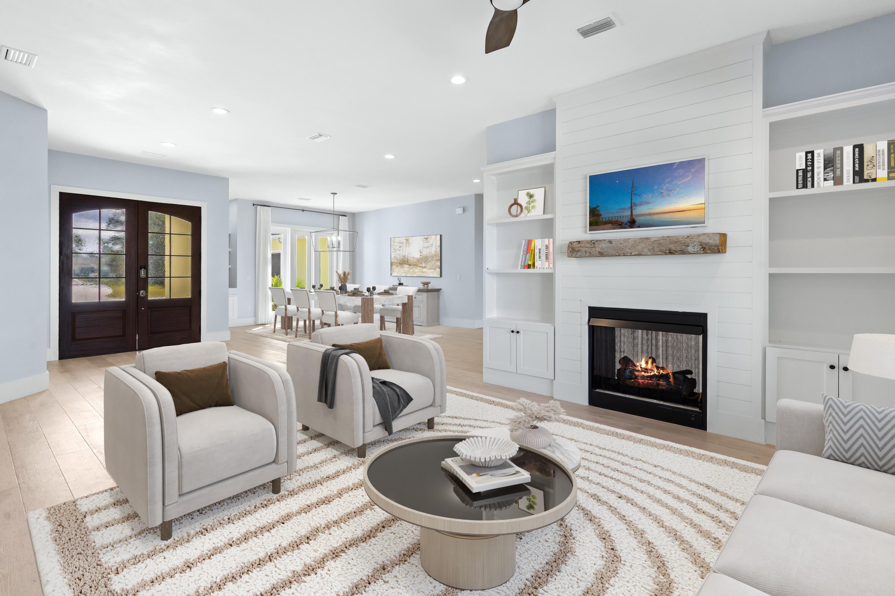399 Driftwood Point Road Santa Rosa Beach, FL 32459 - Photo 14 of 94 a living room with furniture and a fireplace