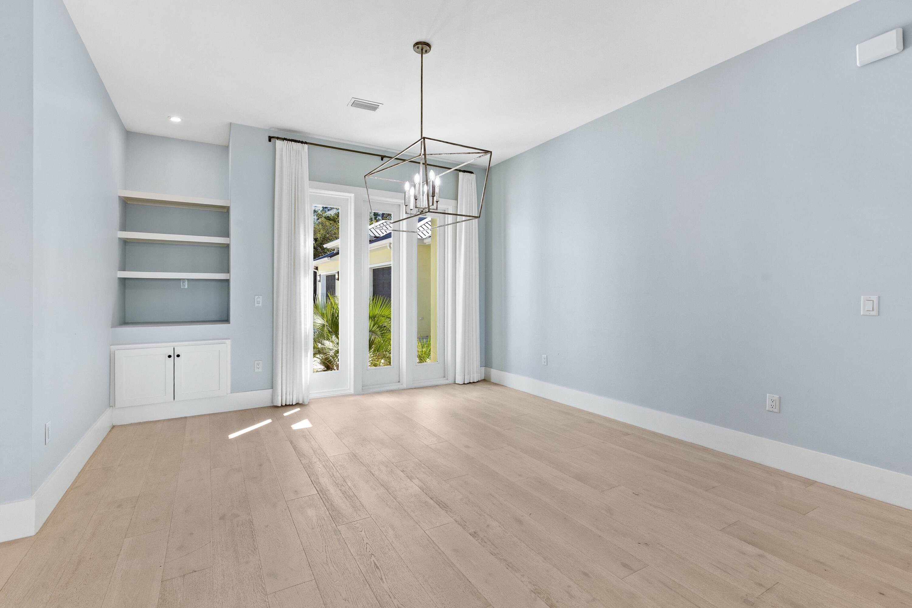 399 Driftwood Point Road Santa Rosa Beach, FL 32459 - Photo 17 of 94 a view of a kitchen with a sink and a window