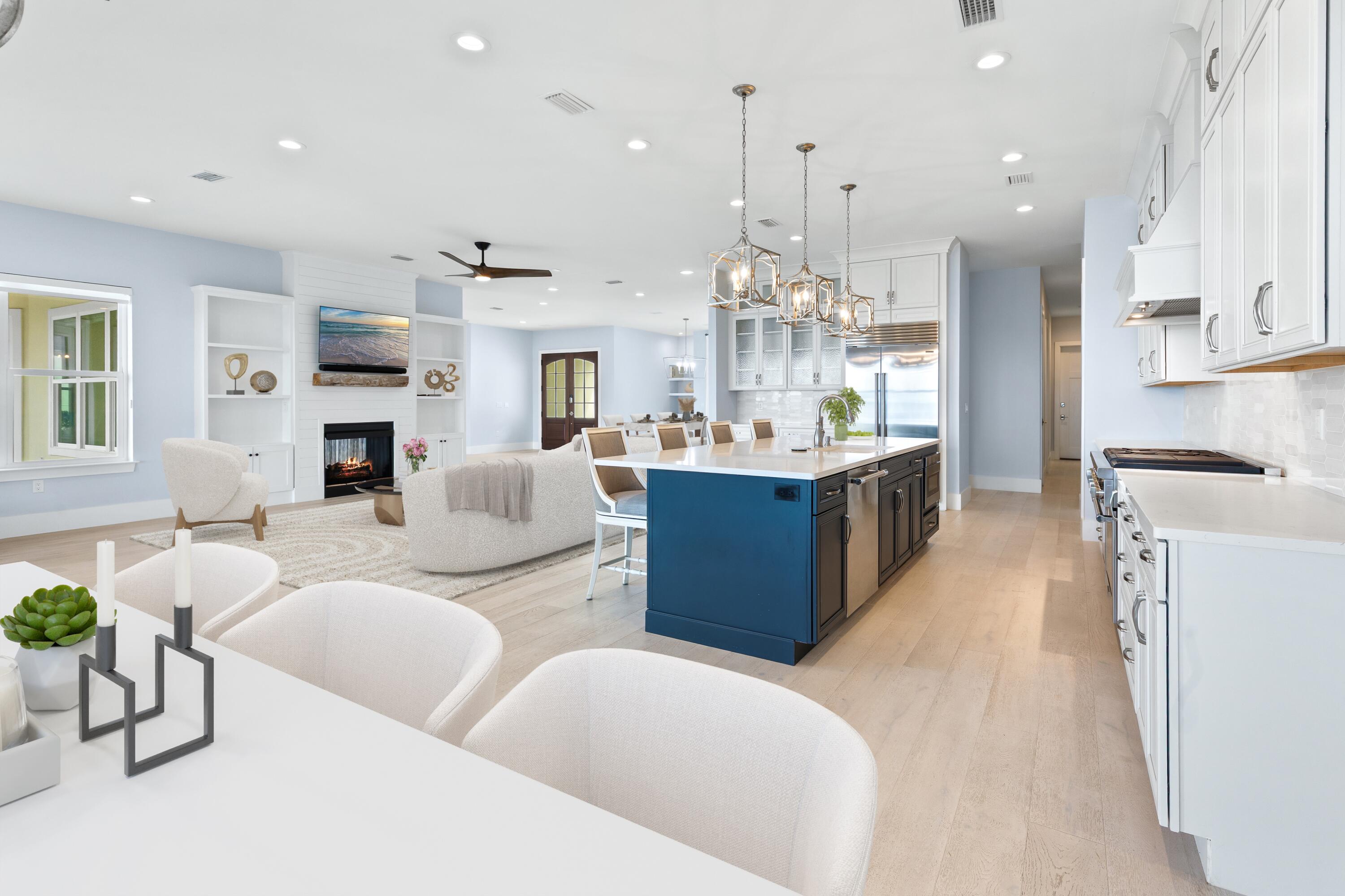 399 Driftwood Point Road Santa Rosa Beach, FL 32459 - Photo 38 of 94 a large kitchen with cabinets a sink a window and stainless steel appliances