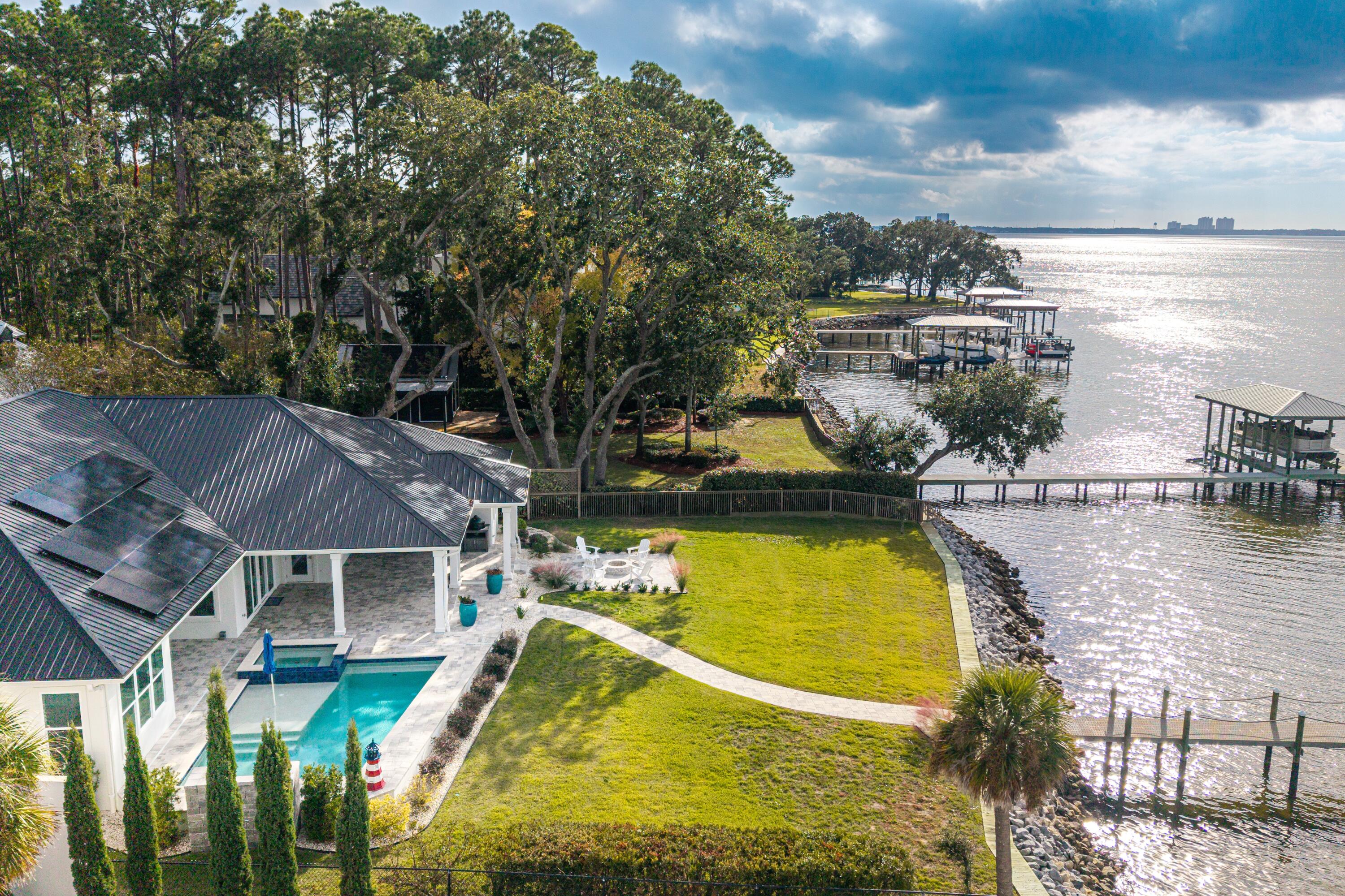 399 Driftwood Point Road Santa Rosa Beach, FL 32459 - Photo 86 of 94 a view of a swimming pool with a lake view