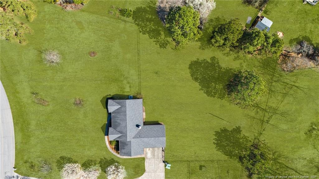 124 East Lake Ridge Road Raeford, NC 28376 - Photo 41 of 44 an aerial view of a residential houses with swimming pool