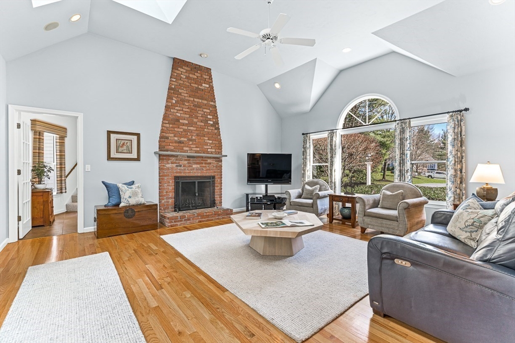 20 Algonquian Drive Natick, MA 01760 - Photo 15 of 40 a living room with furniture fireplace and a large window