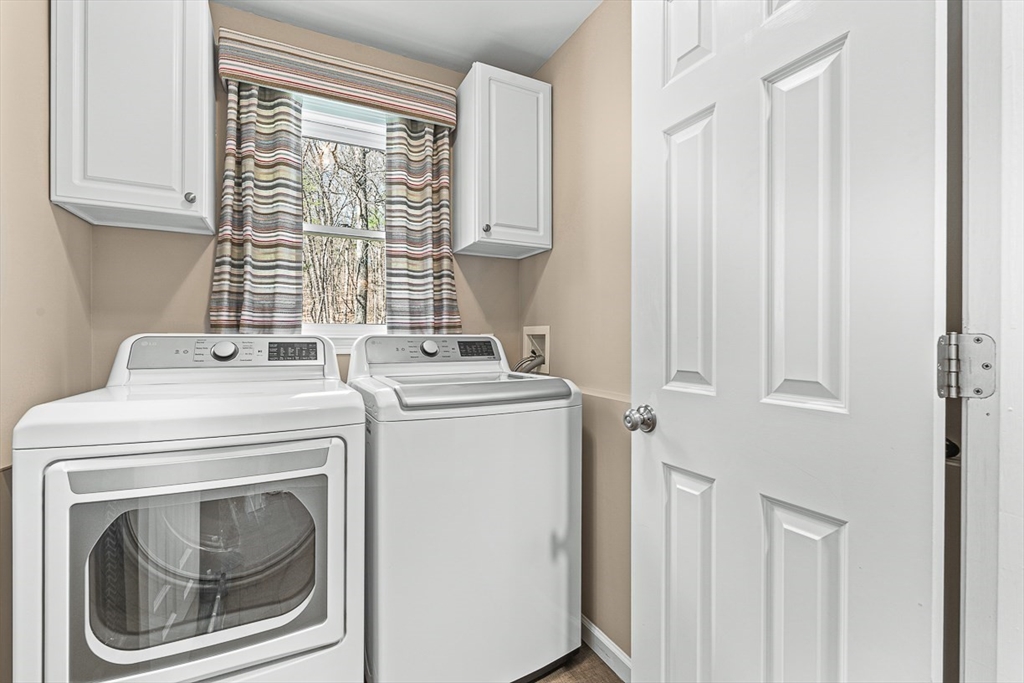 20 Algonquian Drive Natick, MA 01760 - Photo 18 of 40 a utility room with dryer and washer