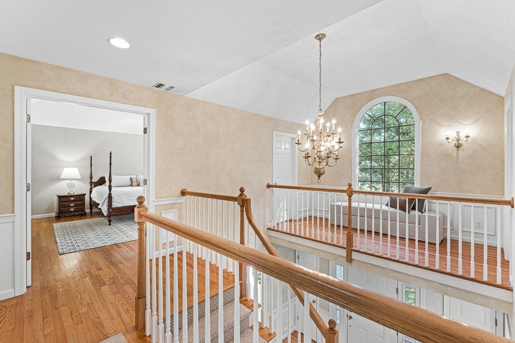 20 Algonquian Drive Natick, MA 01760 - Photo 19 of 40 a view of entryway and hall with wooden floor