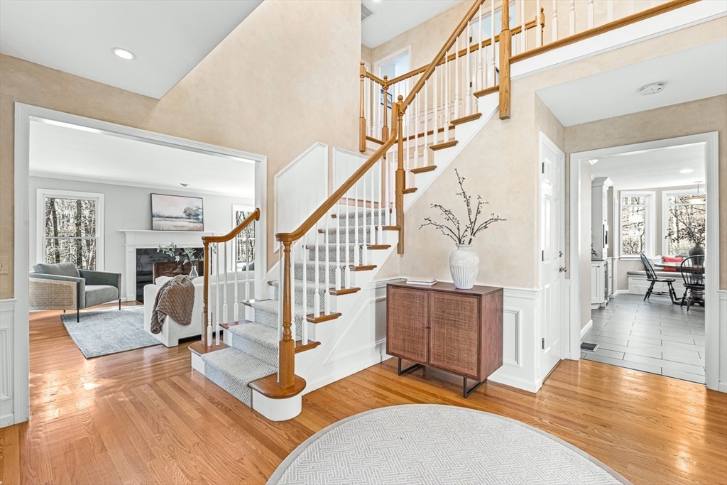 20 Algonquian Drive Natick, MA 01760 - Photo 2 of 40 a living room with furniture and wooden floor