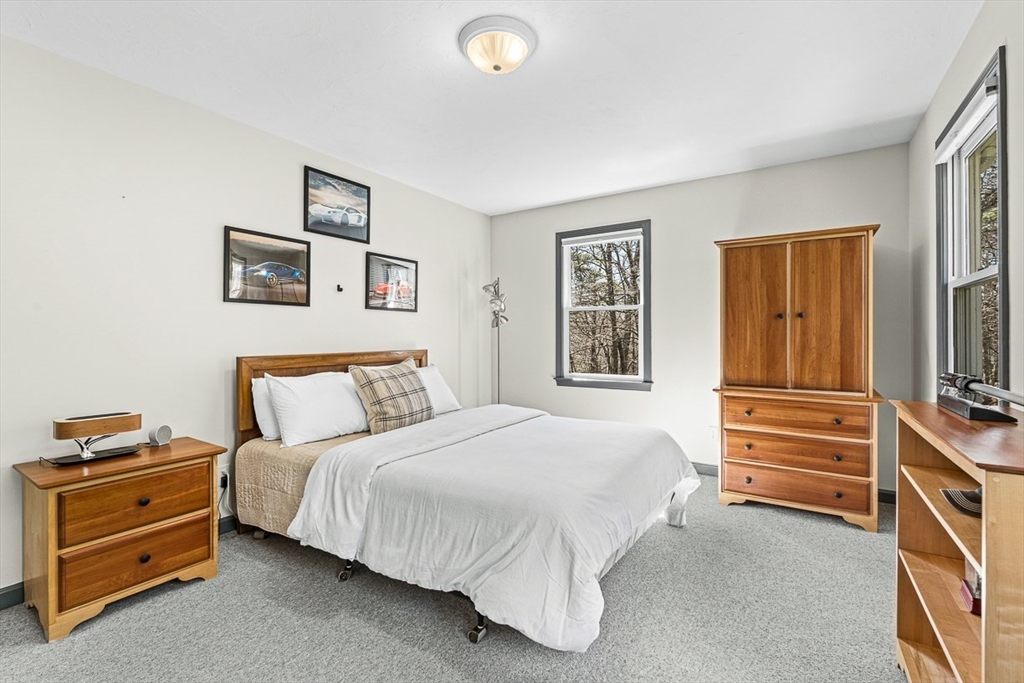 20 Algonquian Drive Natick, MA 01760 - Photo 28 of 40 a bedroom with a bed and a window