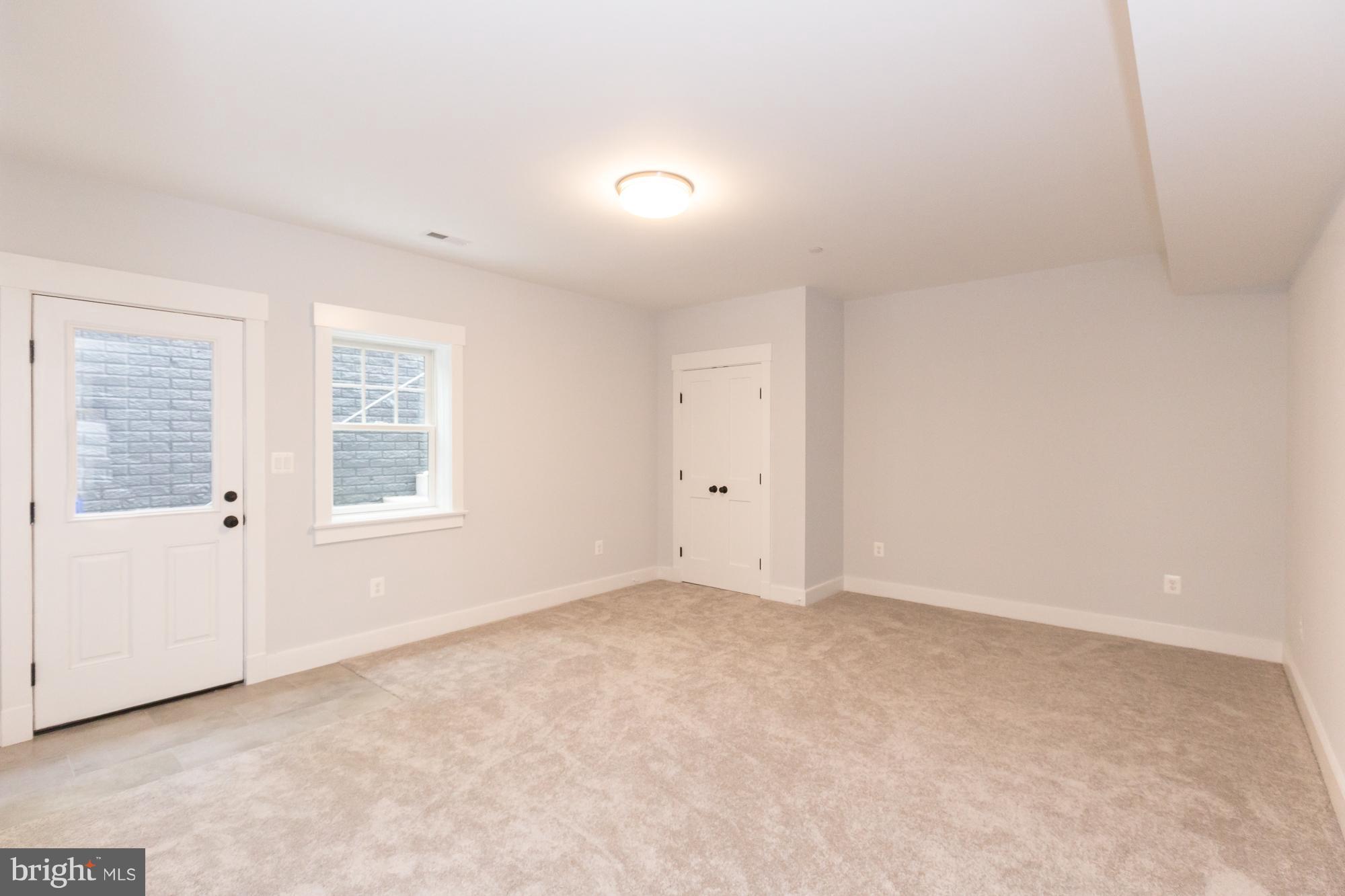 6206 East Halbert Road Bethesda, MD 20817 - Photo 26 of 30 Basement Bedroom w/ Walk Out