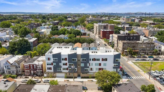 a view of city with tall buildings