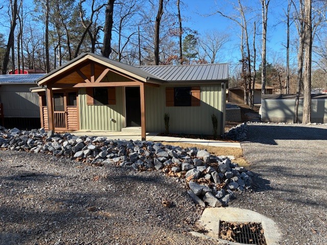 50 Gracy Drive Springville, TN 38256 - Photo 11 of 19 a front view of a house with a yard