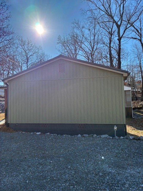50 Gracy Drive Springville, TN 38256 - Photo 5 of 19 a backyard of a house with wooden fence