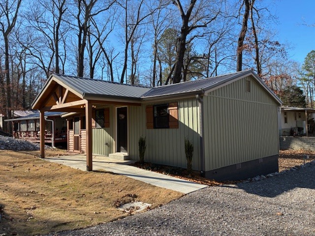 50 Gracy Drive Springville, TN 38256 - Photo 6 of 19 a view of a house with a yard