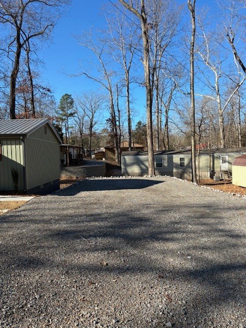 50 Gracy Drive Springville, TN 38256 - Photo 10 of 19 a view of a building with a street view