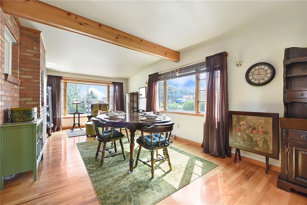 292 Moon Clinton Road Coraopolis, PA 15108 - Photo 13 of 34 a dining room with furniture and a large window