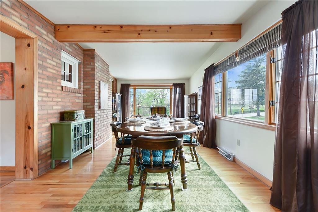 292 Moon Clinton Road Coraopolis, PA 15108 - Photo 14 of 34 a dining room with a table and chairs