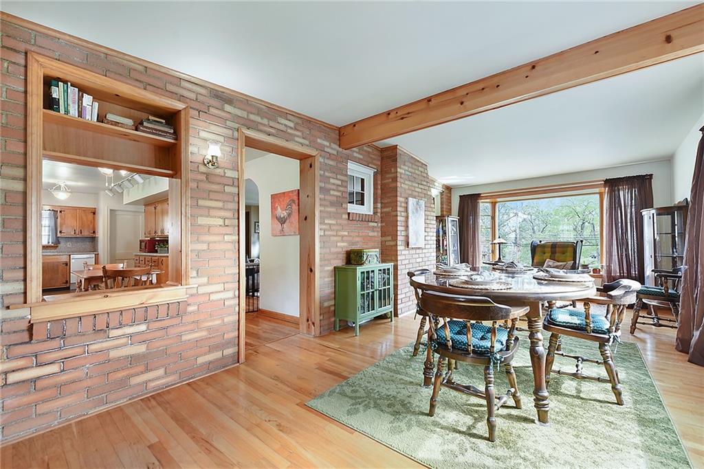 292 Moon Clinton Road Coraopolis, PA 15108 - Photo 15 of 34 a view of a dining room with furniture and wooden floor