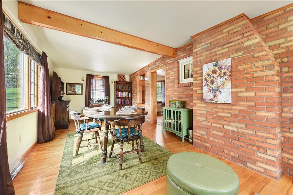 292 Moon Clinton Road Coraopolis, PA 15108 - Photo 17 of 34 a dining room with furniture and wooden floor