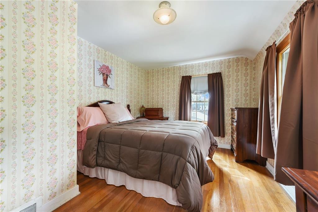 292 Moon Clinton Road Coraopolis, PA 15108 - Photo 22 of 34 a bedroom with a large bed and a closet